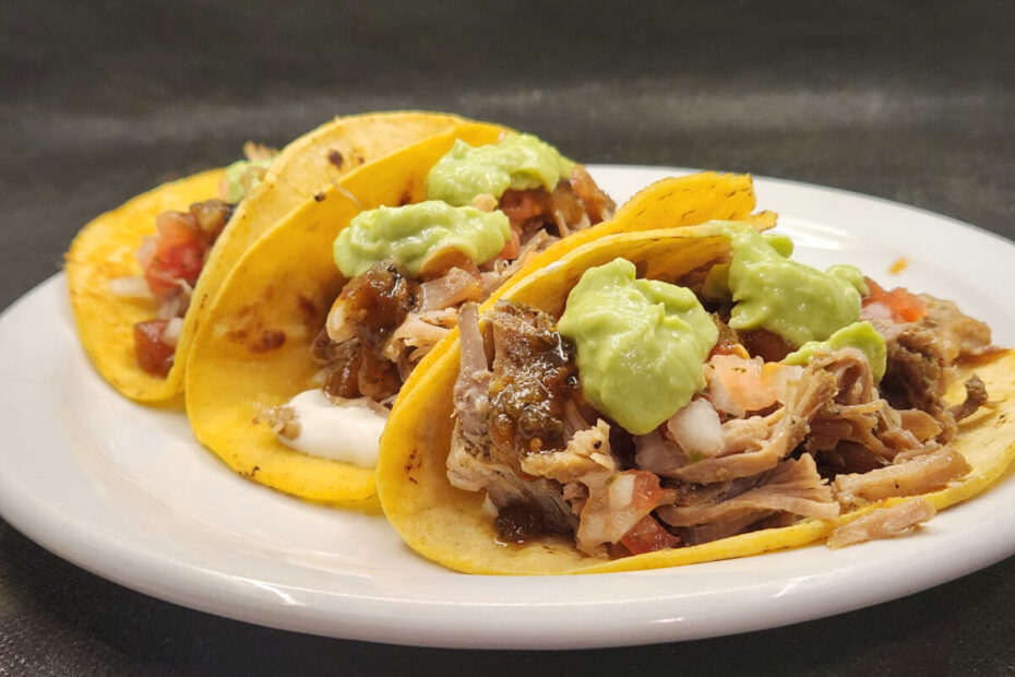 JAHZKITCHEN Carnitas Tacos with Sour Cream, Pico de Gallo, Quemada, and Guacamole