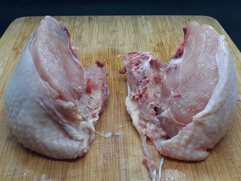 Whole Chicken Breast Tip removed and sliced in half through the bone