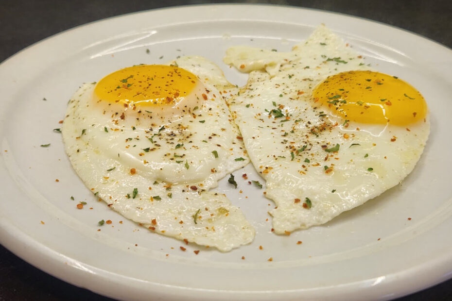 Sunny Side Up Eggs garnished with Parsley and Aleppo