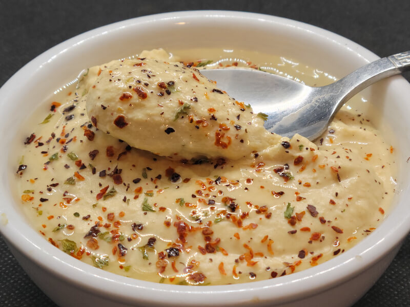 Bowl & Spoon of Hummus