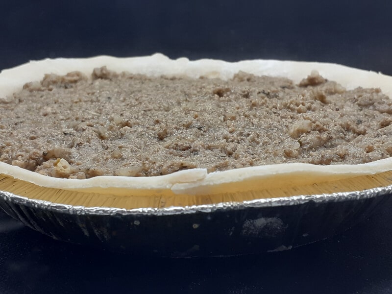 Homemade Pie Shell filled with Tourtiere meat filling