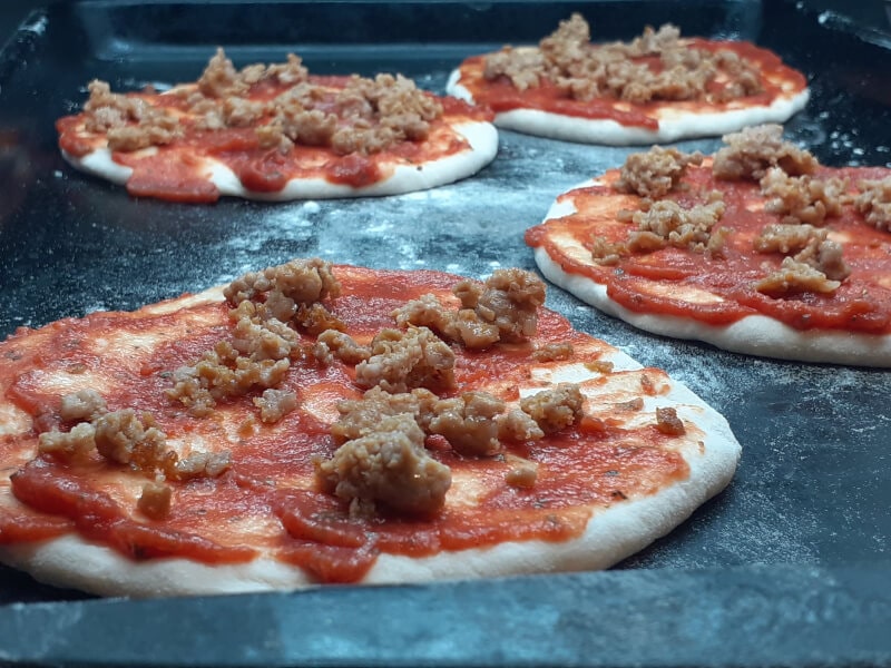 Individual Pitza with Pizza Pasta Sauce and Italian Sausage