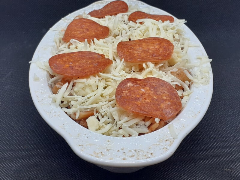 Pizza Pasta bake Pepperoni on top of Cheese