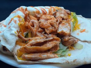 Open Faced Buffalo Chicken Ranch Wrap with extra Hot Sauce