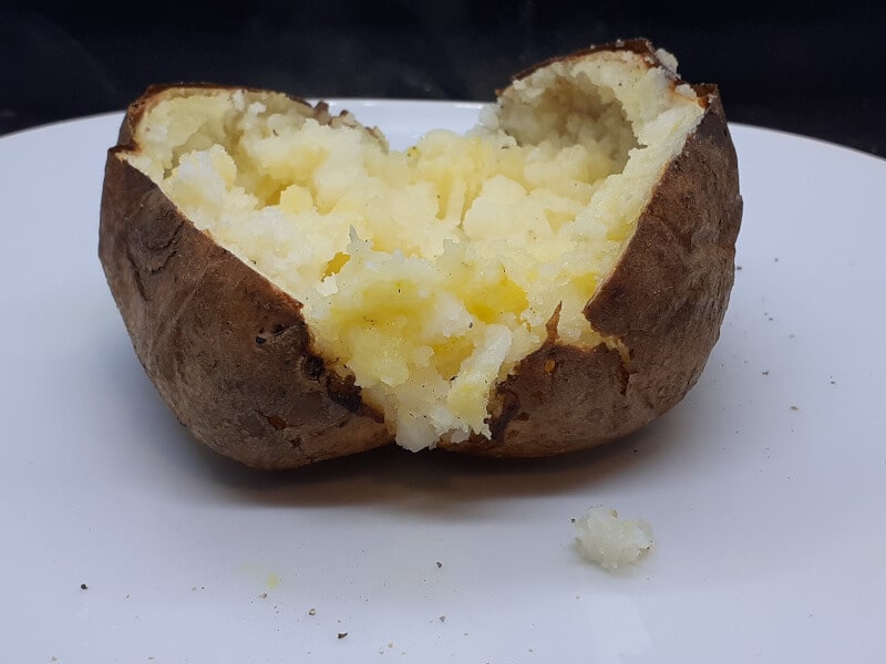 Baked Potato Sliced Halfway through and squeezed