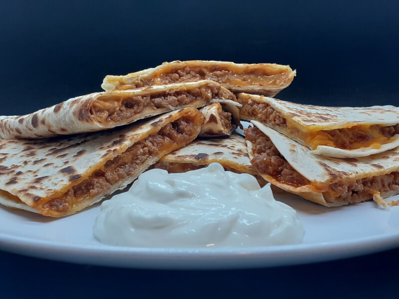 Beef and Cheese Taco Quesadillas with Sour Cream