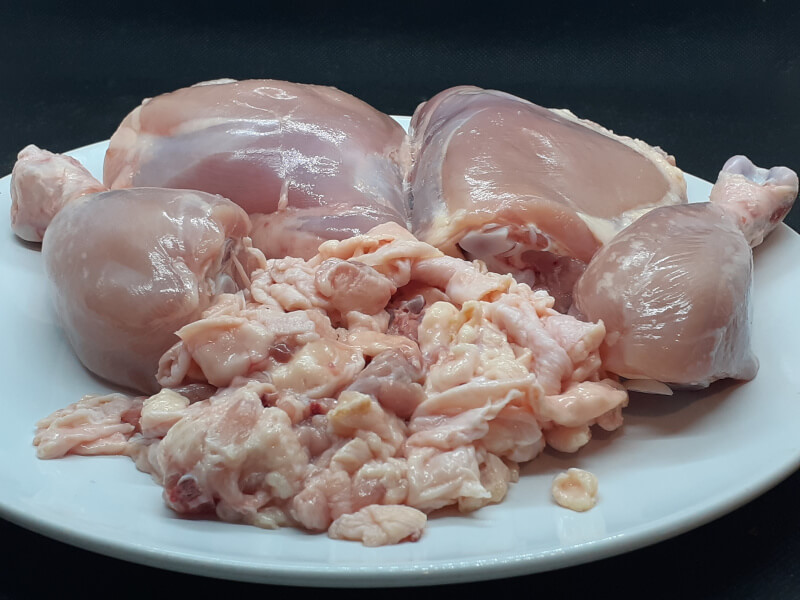 Chopped Chicken Quarters Skin removed