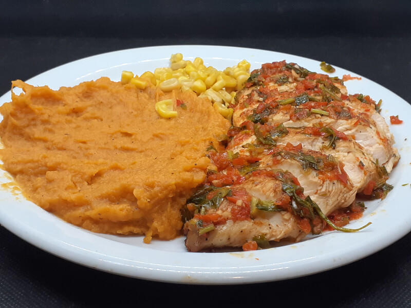 Sliced Chimichurri Chicken Breast with Mashed Sweet Potatoes and Corn