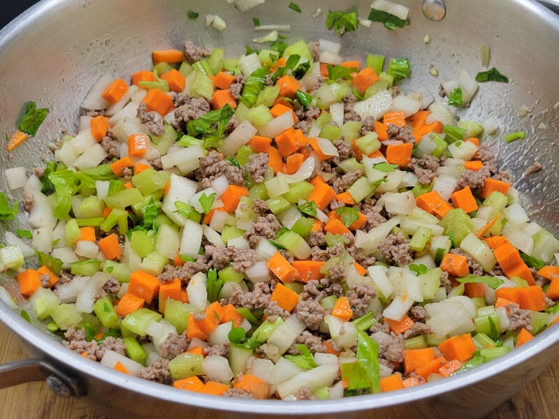 228 g ground beef with diced mirepoix