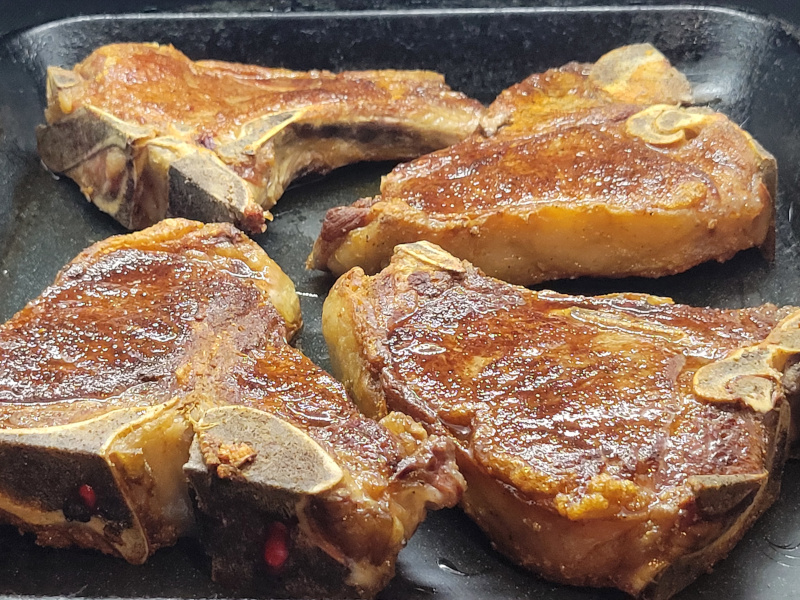 Seared Veal T-Bone Steak finishing in the oven at 350 F