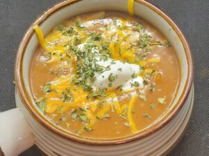 Burrito Soup with Cheese Sour Cream and Epazote