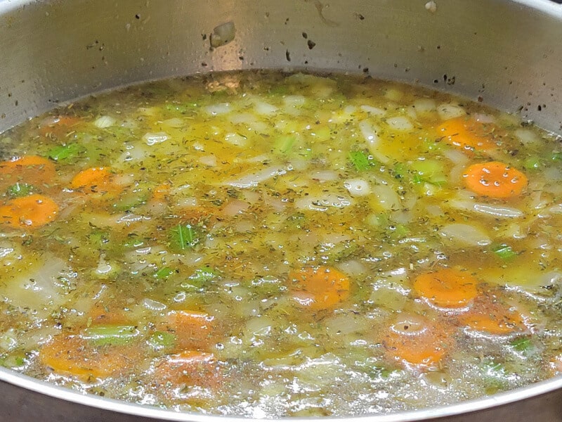 Hambone Soup adding the Ham Broth