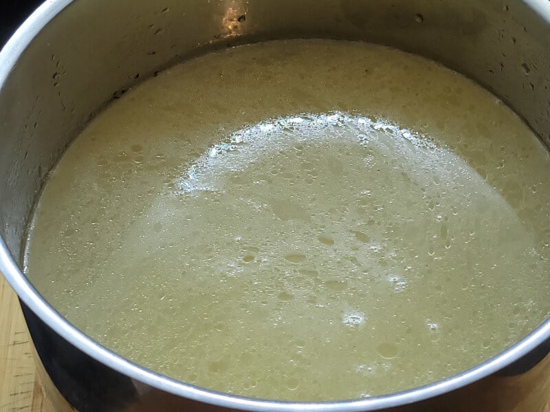 Strained Turkey Broth filled with Cold Water