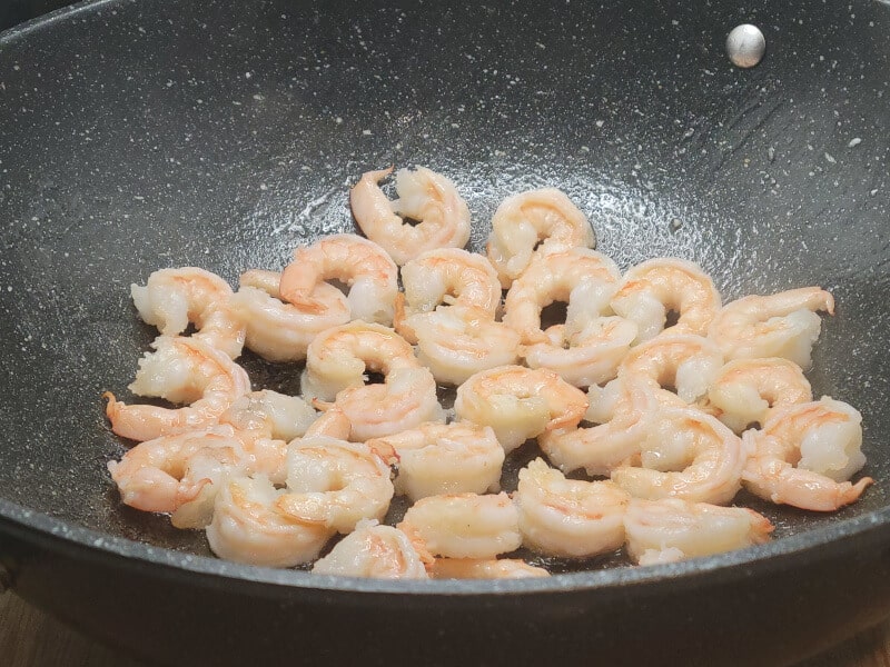 Frying Shrimp 1 minute each side then tossing for 1 minute