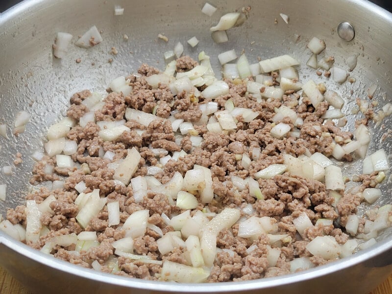 Browning Ground Beef with diced Onion and Garlic