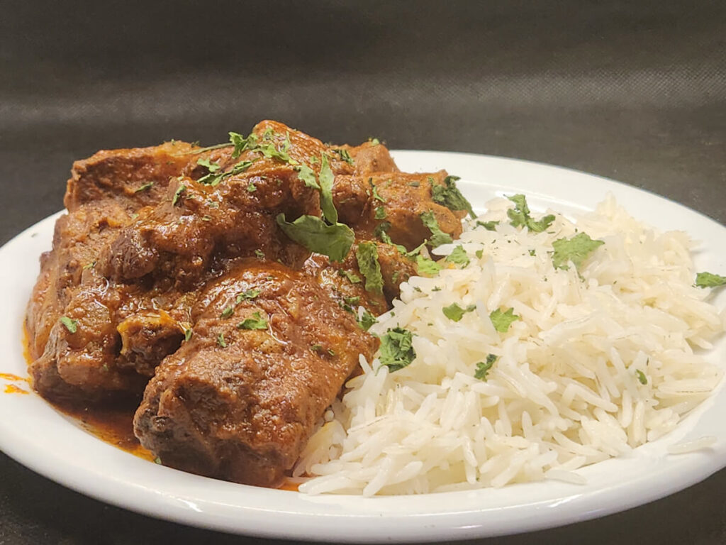 JAHZKITCHEN Mexican Ribs with Rice and Cilantro Garnish
