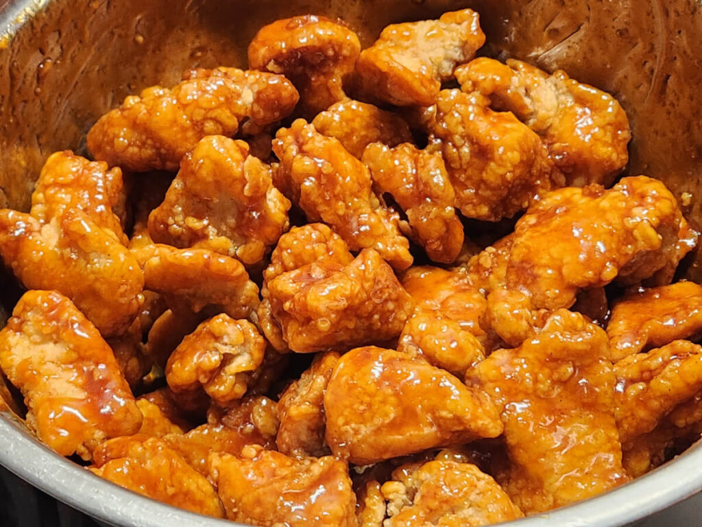 JAHZKITCHEN Tossing Homemade Boneless Chicken Wings in Yangnyeom Sauce