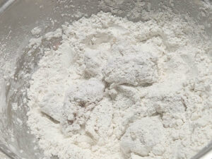 JAHZKITCHEN Tossing the Chicken for even coverage