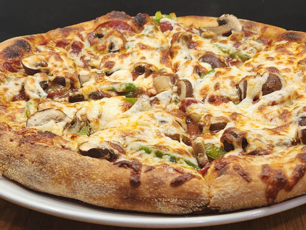 JAHZKITCHEN Sliced PGM Pizza on a Plate