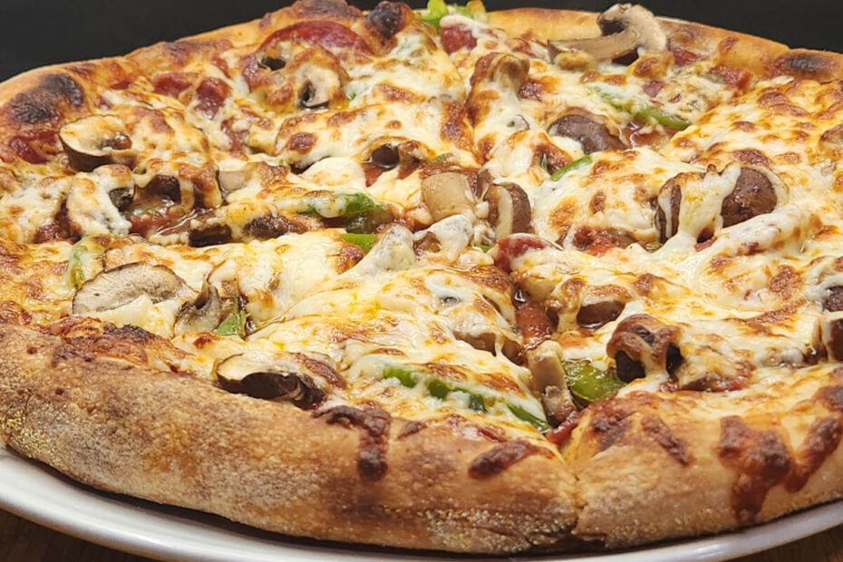 JAHZKITCHEN Sliced PGM Pizza on a Plate