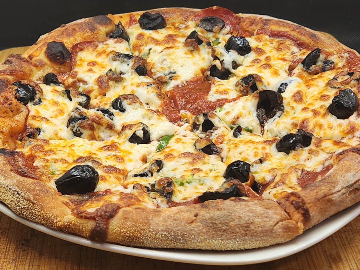 JAHZKITCHEN Sliced PRJ Pizza on a Plate