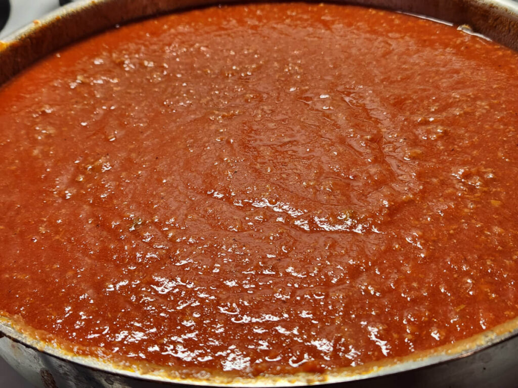 JAHZKITCHEN Adding Passata and Water to start simmering Bolognese