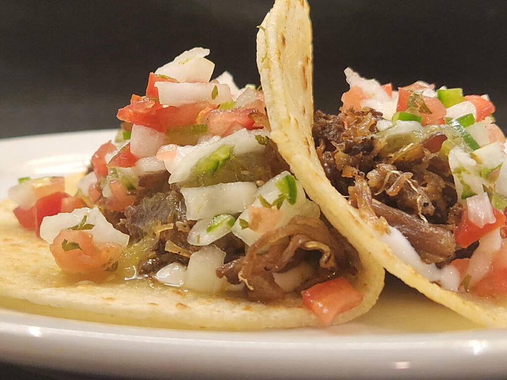 JAHZKITCHEN Carnitas Tacos with salsa Verde, pico de gallo and sour cream