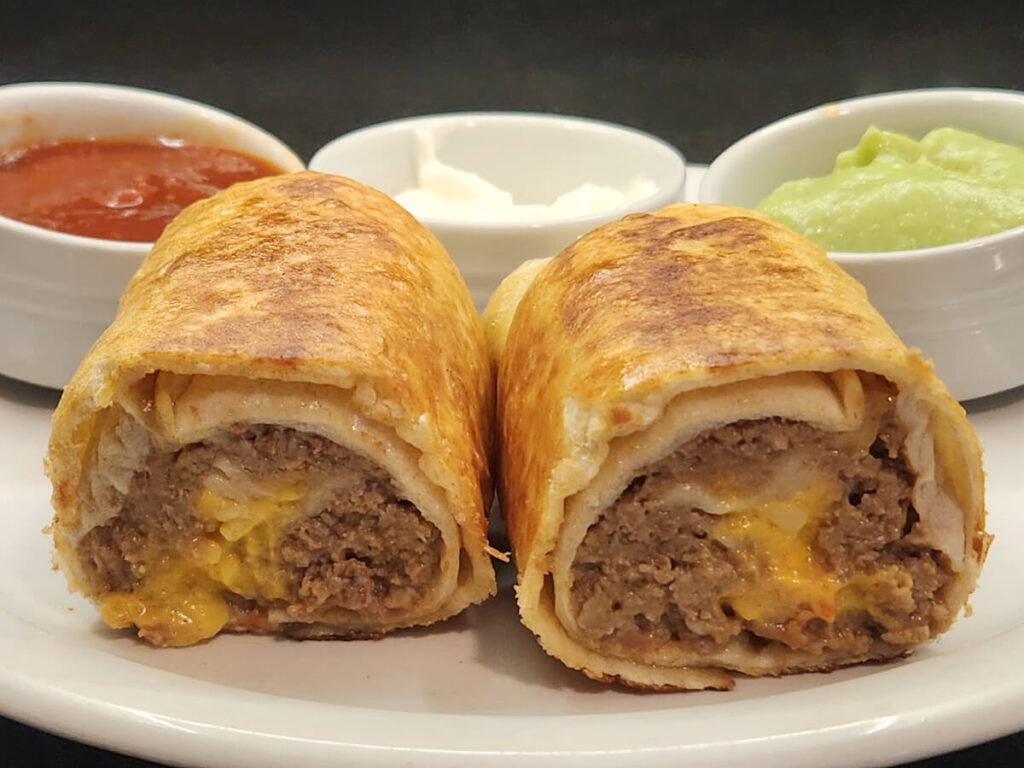 Nacho Burrito with Sour Cream, Salsa, and Guacamole Nacho Burrito with Sour Cream, Salsa, and Guacamole